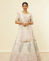 alt message - Mohey Women Beige Cream Sitara Embroidered Lehenga with Stone Work image number 0